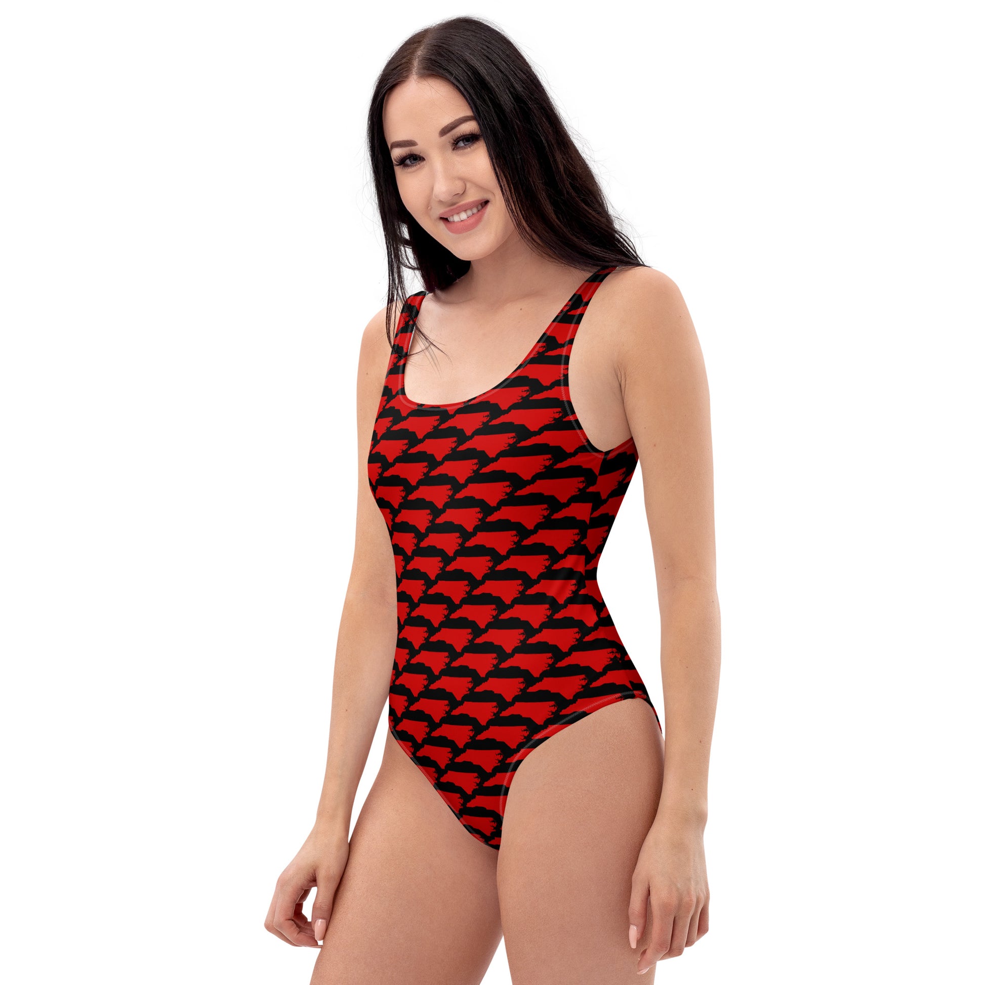 Front view of Carolina Inferno Swimsuit with bold red NC design on black, studio shot