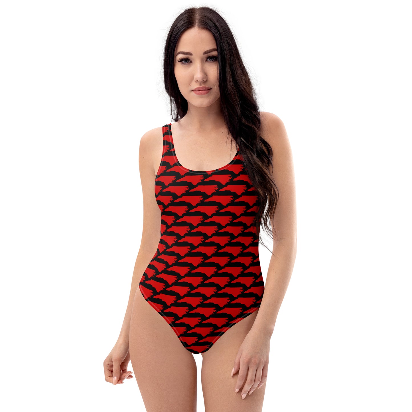 Front view of the Carolina Inferno Swimsuit with bold red NC print on black, modeled on white background