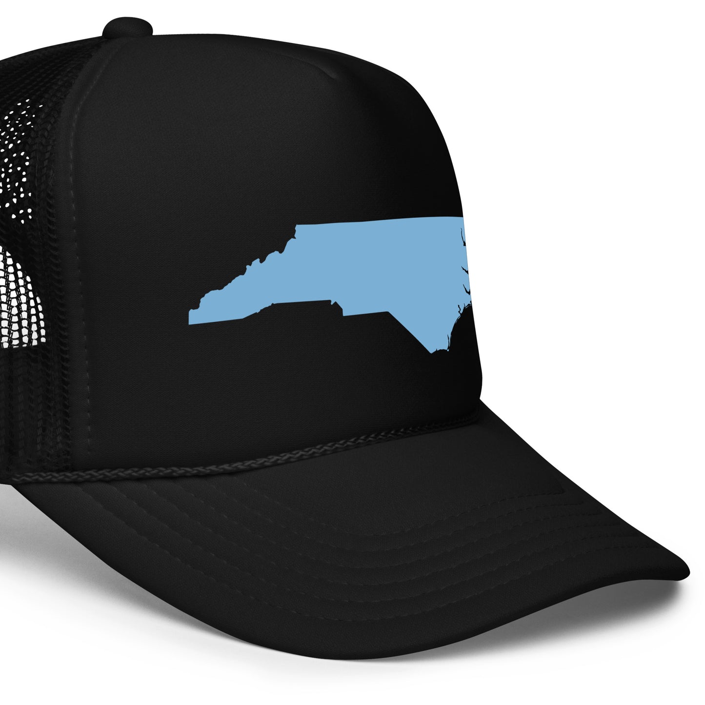 "Black Baby Blue NC State Shape Foam Trucker Hat – Stylish Accessory for Nature Lovers. Featuring a prominent light blue outline of North Carolina, this hat combines the classic trucker style with a breathable foam front and mesh back. Perfect for showing off your love for the Tar Heel State outdoors, whether you're hiking, camping, or exploring the natural beauty of North Carolina. Available in multiple colors, this hat is both a fashionable and functional addition to your wardrobe."